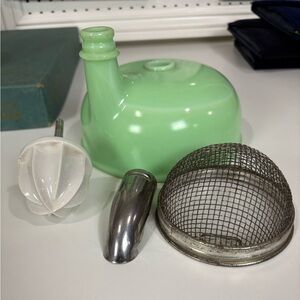 Glowing Jadeite juicer with attachments